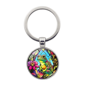 Artistic frog prince glass cabochon keychain with colorful floral patterns and silver ring