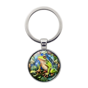 Artistic Frog Prince glass gem keychain with green floral illustration and metal ring