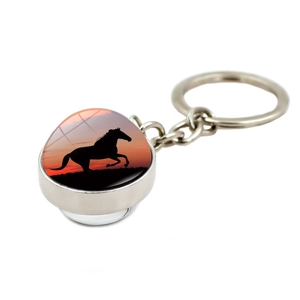 Silver horse head keychain with double-sided crystal ball pendant featuring sunset silhouette