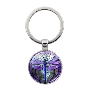 Vintage dragonfly keychain with artistic stained glass pattern on a silver metal ring