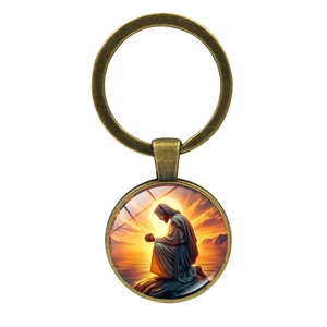 Porte-clés religieux en bronze avec Jésus priant au coucher du soleil sous dôme