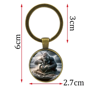 Vintage bronze keychain with gorilla beach heart glass pendant and size measurements