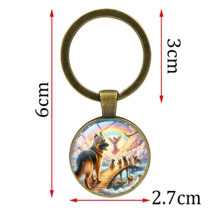 Vintage German Shepherd angel keychain with bronze frame and size markings in centimeters