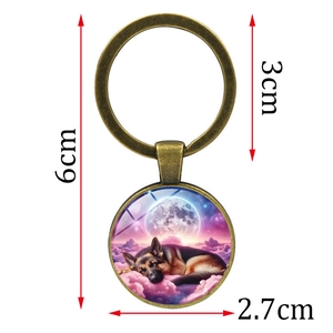 Sleeping German Shepherd keychain in bronze metal with size specifications 6cm total length