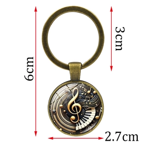 Vintage Bronze Musik Schlüsselanhänger mit Klaviertasten und Notenschlüssel Motiv