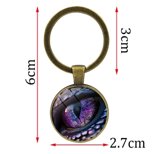 Vintage bronze keychain with mystical dragon eye glass pendant and detailed dimensions