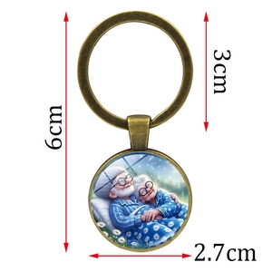 Bronze-Schlüsselanhänger mit Illustration eines Paares unter den Sternen, 6 cm Gesamtlänge
