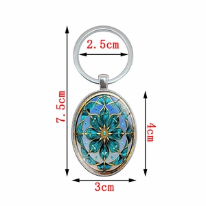 Porte-clés pendentif ovale bohème avec motif mandala bleu et cadre en métal argenté