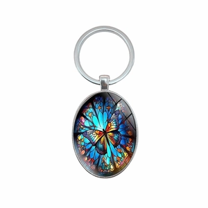 Kreativer Schmetterling Schlüsselanhänger mit blauem Glasanhänger und silbernem Schlüsselring