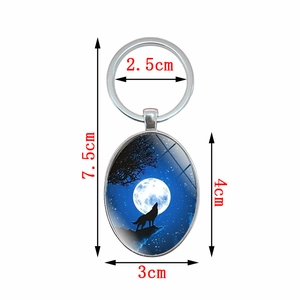 Wolf howling at full moon pendant keychain with silver metal ring for car keys or bags