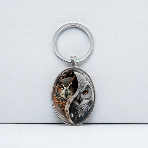 Men's metal owl keychain with creative oval yin yang owl charm on a silver keyring