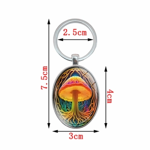 Porte-clés ovale avec pendentif champignon coloré sur anneau en métal argenté avec dimensions