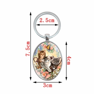 Portachiavi ovale in vetro cabochon con gattini e fiori completo di misure dettagliate