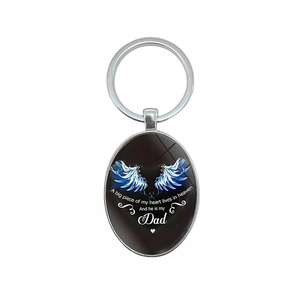 Oval memorial keychain with blue angel wings and 'My Dad' quote on a black background