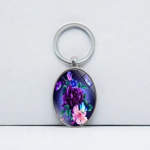 Elegant oval keychain featuring blue butterfly and purple rose art on silver metal ring