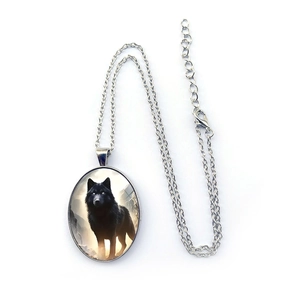 Oval wolf pendant necklace in silver alloy featuring a mystic wolf head art illustration