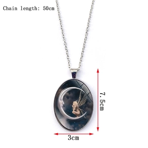 Macro shot of oval moon goddess pendant with 50cm chain length and 7.5cm size details
