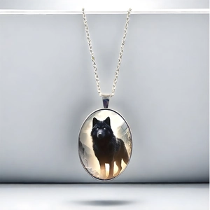 Oval wolf pendant necklace with lone wolf in misty valley and silver link chain