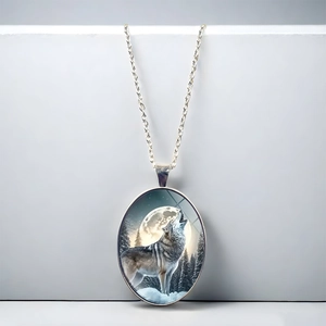 Artistic howling wolf and full moon oval pendant necklace with a fine silver chain