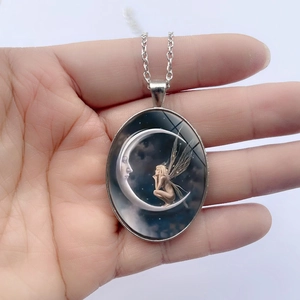Silver oval moon goddess fairy pendant necklace with celestial starry night art
