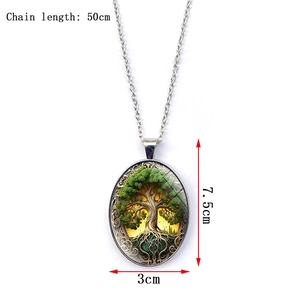 Detail view of oval Tree of Life pendant showing 50cm chain and 7.5cm pendant length