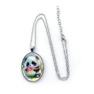 Detailed view of oval panda pendant necklace with rainbow heart on a silver chain