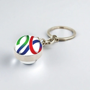 Spherical double-sided metal keychain with 2026 World Cup logo glass gemstone pendant