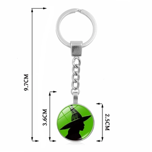 Porte-clés sorcière Glinda Elphaba avec pendentif vert et chaîne en métal de 9,7 cm