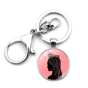 Silver Wicked Witch metal keychain with pink crown silhouette pendant and lobster clasp