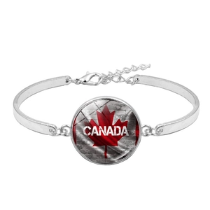 Detail view of the Canada flag glass cabochon with adjustable silver chain and lobster clasp