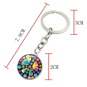 Detailed size chart showing 7.8cm length for peace sign floral glass keychain charm