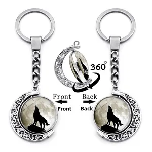 Rotating moon howling wolf keychain with a 360-degree double-sided glass pendant