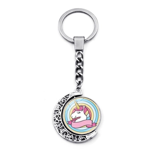 Rotating moon keychain with cartoon unicorn pendant made of silver polished metal alloy