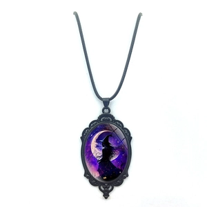 Vintage oval witch pendant necklace with purple moonlit silhouette on black leather cord