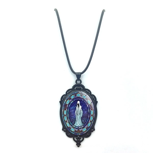 Gothic pendant necklace featuring a hooded phantom with stained glass pattern and black frame