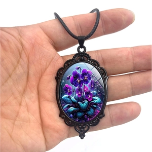 Vintage oval pendant necklace featuring purple flower pattern and black filigree frame
