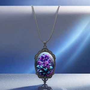 Vintage oval pendant necklace with purple pansy flower and black carved hollow frame