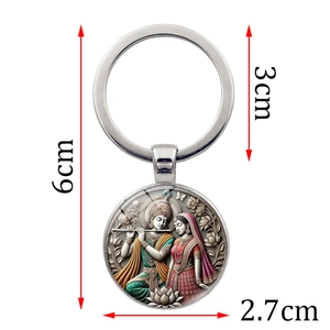 Silver Radha Krishna keychain pendant with dimensions showing 6cm total length and 3cm ring
