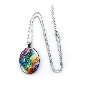 Artistic oval pendant necklace featuring colorful dreamy wave patterns on a silver chain