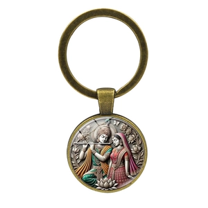 Bronze Radha Krishna keychain with 3D religious illustration on white background