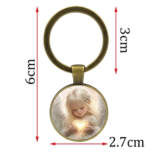Bronze angel heart keychain pendant featuring a round vintage illustration and dimensions
