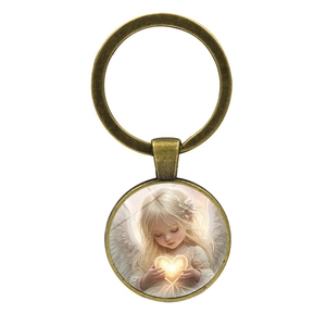 Vintage bronze keychain with charming blonde angel holding a heart pendant on white background