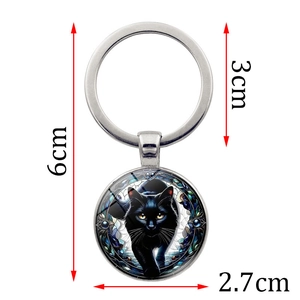 Mysterious black cat keychain pendant with silver metal ring and 2.7cm glass cabochon