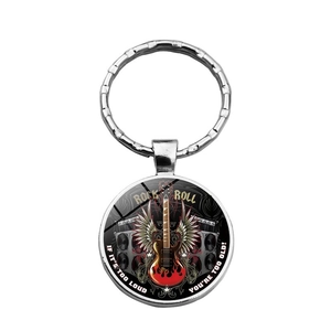 Rock and roll metal keychain with guitar and flame graphic on white background
