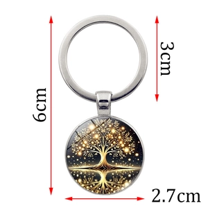 Silver Tree of Life keychain with glowing gold tree pendant and size measurements