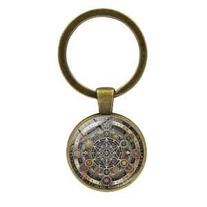 Metatrons Würfel Schlüsselanhänger aus Bronze mit heiliger Geometrie und Glas-Anhänger