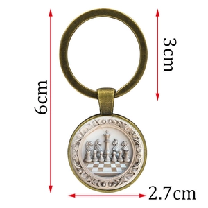 Vintage bronze chess pattern keychain featuring a 2.7cm circular charm and metal ring