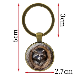 Retro bronze raccoon in tree hollow keychain pendant with clear size dimensions