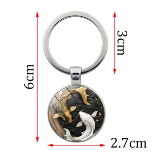 Yin Yang Koi Fish keychain with round metal pendant and glass cabochon in 6cm length
