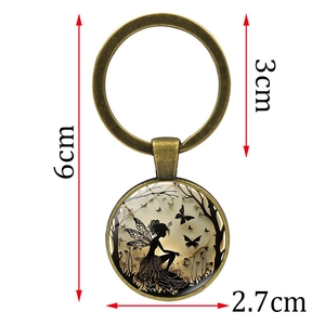 Bronze fairy and butterfly keychain with dimensions 6cm total height and 3cm ring size